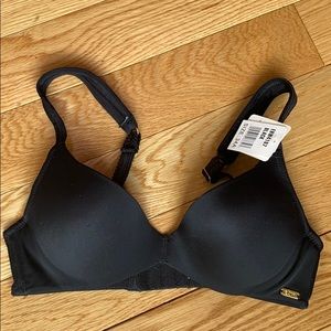 Brand new black push up bra 34A